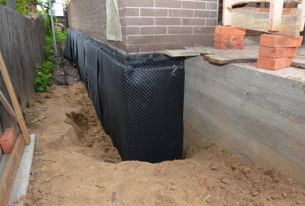 Happy homeowners after waterproofing job in Pomona